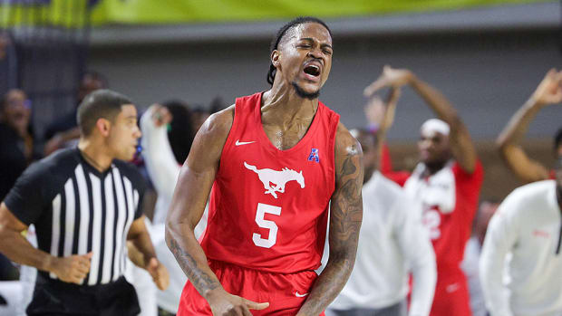 Southern Methodist Mustangs guard Ricardo Wright (5) reacts after a play against the West Virginia Mountaineers in the second half during the Fort Myers Tip-Off at Suncoast Credit Union Arena.